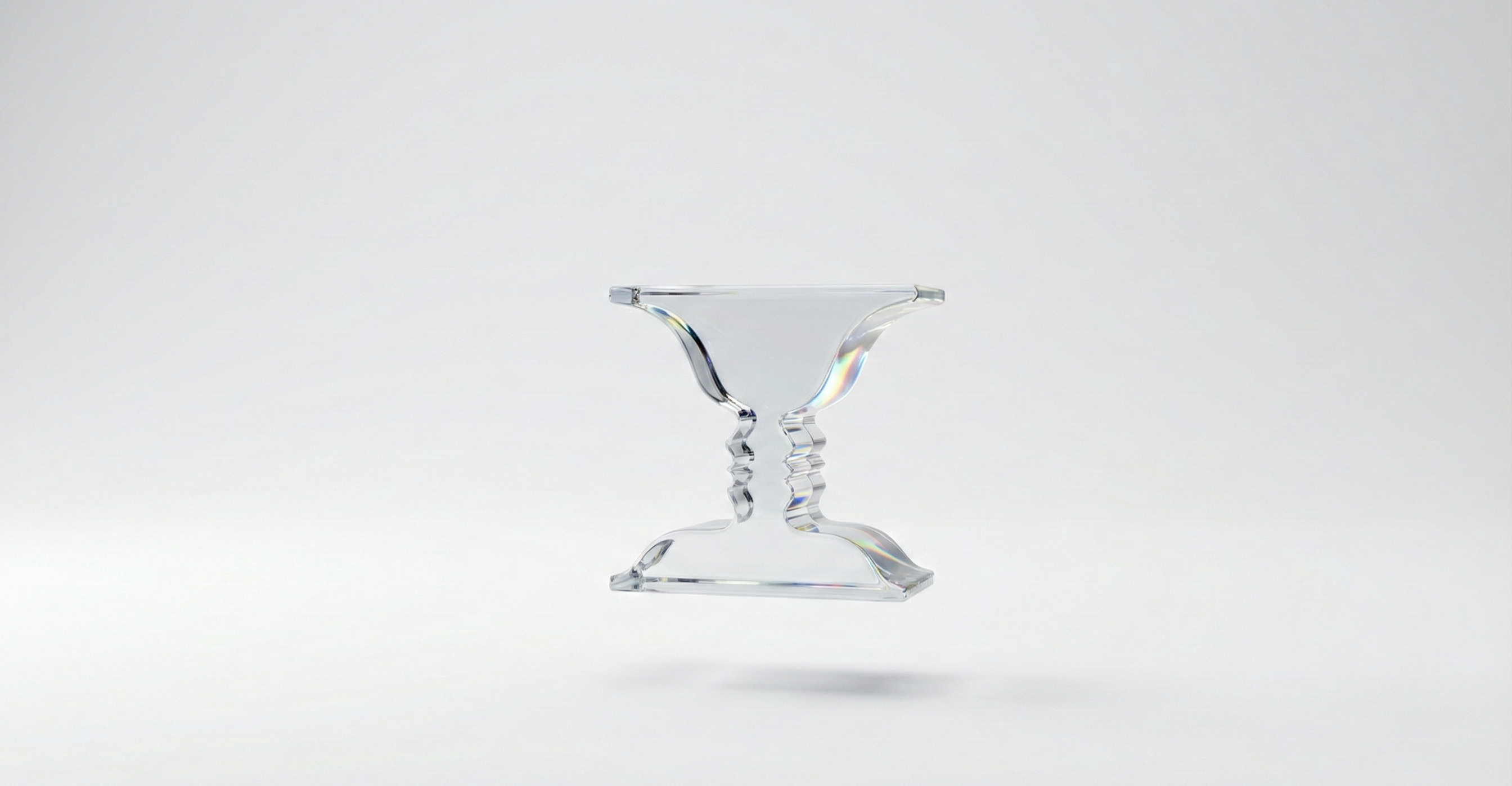 Delicate flowers taped to a wall.